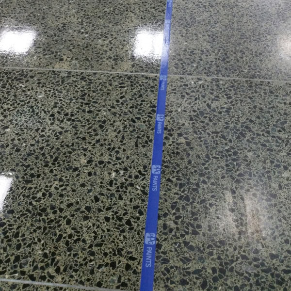 CC-DemoPage-Results-Image-600x600 Before and after terrazzo floor treatment - clear divide between the two with blue tape