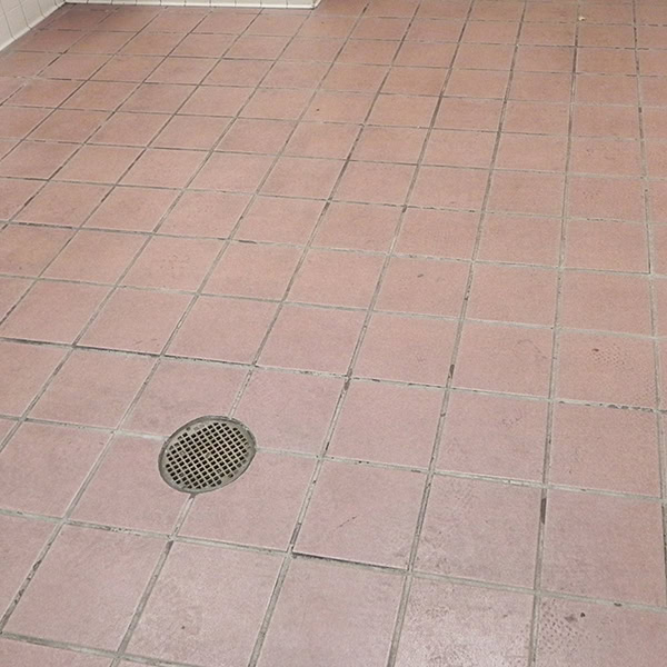Dirty tile and grout. Full restoration: deep clean, acid scrub, grout recolor, and performance coating.
