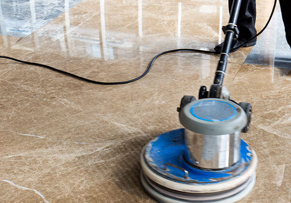 cleaning marble floor with a buffer - Corporate Care
