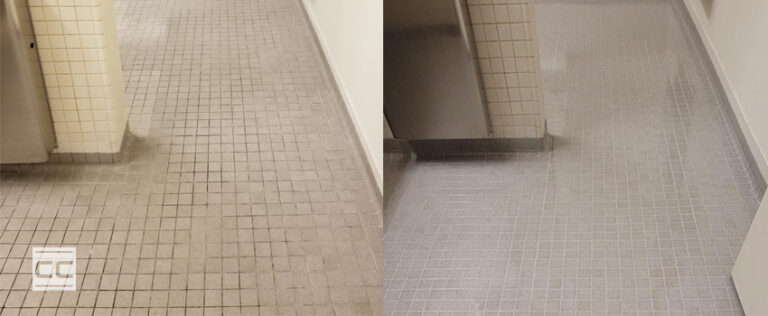 Complete restroom tile and grout floor restoration for a prominent oil and gas firm - before and after image